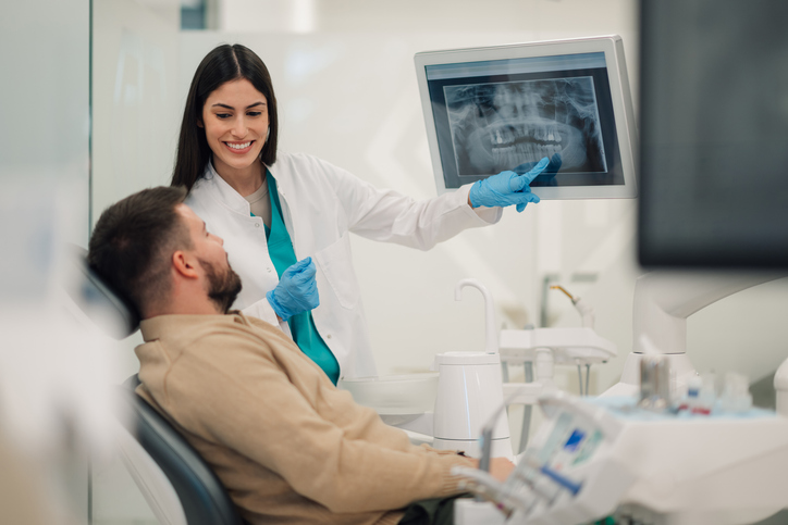 New patient receiving dental exam from a dentist in Leesburg